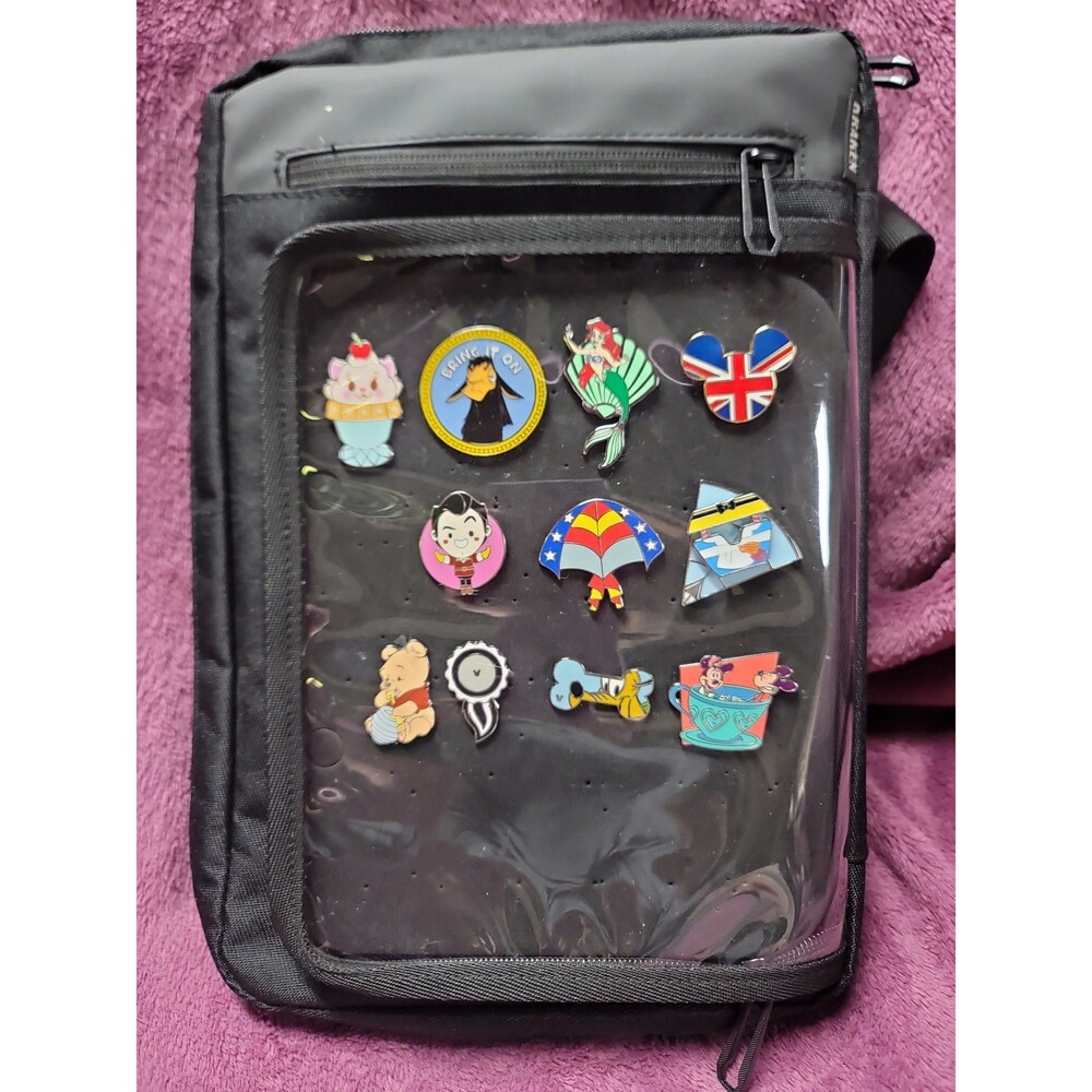Kraken Mako Crossbody bag, filled with over 40 pins .